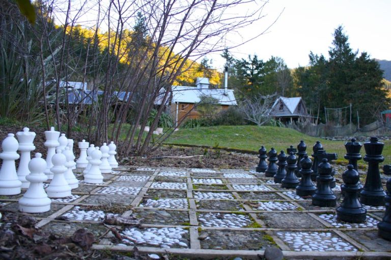 Outdoor chess at On the Track Lodge Nydia Bay