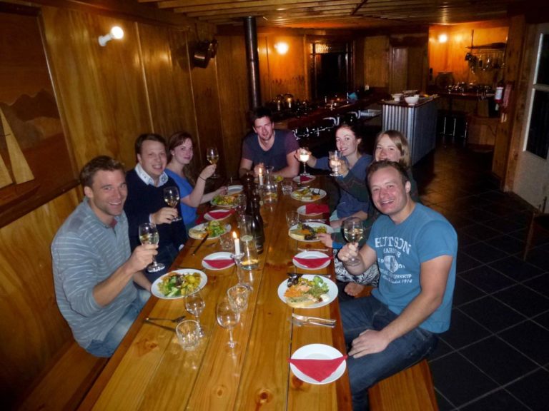 Diners at On the Track Lodge Nydia Bay